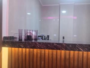 a kitchen with a granite counter top and a counter top at Luxor lights palace in Luxor