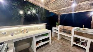 a bathroom with a sink and a counter with a sink at L'Ape in Fogliano +17 photos