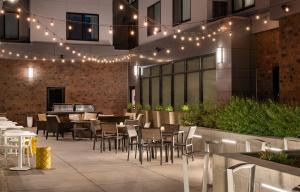 a patio with tables and chairs and lights at Residence Inn Walnut Creek in Walnut Creek