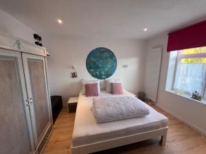 a bedroom with two beds and a window at Vakantiehuis Cédric in mesen +49 photos