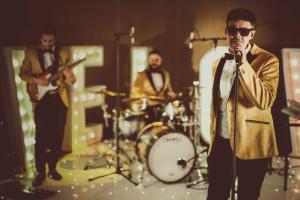 a group of musicians playing on a stage at Scarlett Near Mount Zion in Bugallon +37 photos