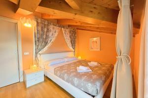 a bedroom with a bed in a room at Mastena Elegante in San Siro +14 photos
