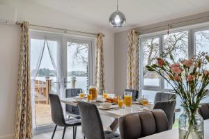 a dining room with a table and chairs at 3 Bed in Tallington oc-s30309 in Yaxley