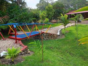 a playground in the yard of a house at Finca Ecoturística Canaguaros in Tauramena