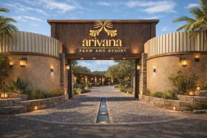 an entrance to a resort with a sign that readsarma farm and resort at Arivana Resort in As Sab‘ Ābār ash Sharqīyah