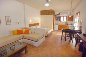 A bed or beds in a room at 9 Muses - Paros
