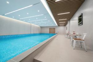Baseinas apgyvendinimo įstaigoje 上海悦来度假酒店Shanghai Joy International Resort Hotel arba netoliese dar 151 nuotrauka