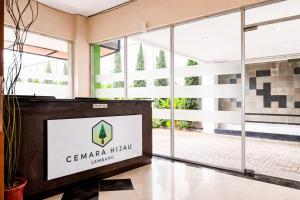 a view of the lobby of the ceasar hilux building at RedDoorz Plus near The Great Asia Africa Lembang in Bandung