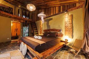 a bedroom with a large bed in a room at Puluong Qui E Ora in Lũng Tiềm +192 photos