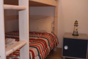 En eller flere senge i et værelse på Albufeira Lovely new Apartment W/ Pool + 34 billeder