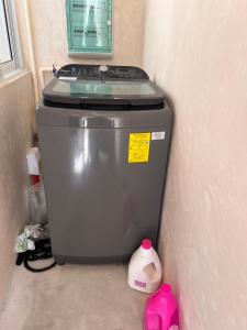 a trash can in the corner of a room at La Belle Dojo in Chelem