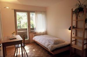 
Ein Bett oder Betten in einem Zimmer der Unterkunft Pension Casa Selva
