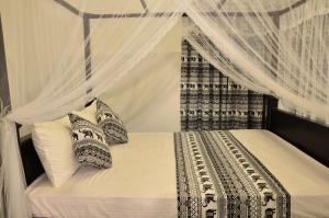 Krevet ili kreveti u jedinici u objektu Neo Bay Hotel