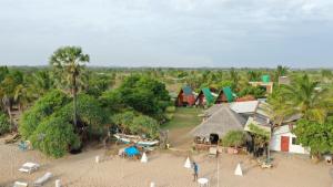 an aerial view of a resort on the beach at Thats why beach hotel in Trincomalee +11 photos