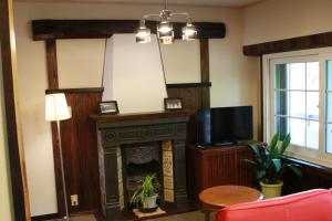 TV a/nebo společenská místnost v ubytování Guest House Dohei