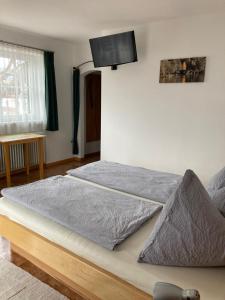 Postel nebo postele na pokoji v ubytování Pension Winter