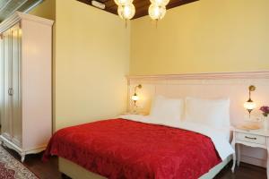 Postel nebo postele na pokoji v ubytování Bursa İpekyolu Hotel