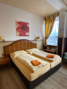 a bedroom with two beds in a room at Hotel U Branky in Stříbro +19 photos