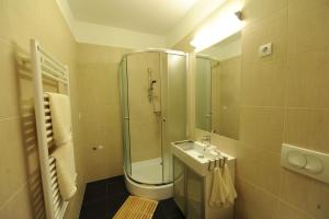 Koupelna v ubytování Toldi Apartments Pécs