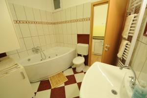 Koupelna v ubytování Toldi Apartments Pécs