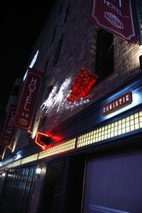 a building with christmas lights on the side of it at Christie Hotel 크리스티 호텔 in Seoul