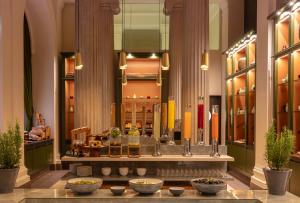 a store lobby with a lot of items on display at Anantara Palais Hansen Vienna - A Leading Hotel of the World in Vienna