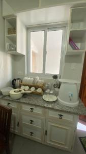 ครัวหรือมุมครัวของ Joann Homestay 25