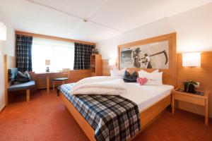 Postel nebo postele na pokoji v ubytování Hotel Sonnblick