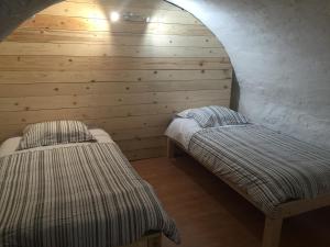 Un pat sau paturi într-o cameră la Maison Le Plai-Syl