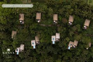 an overhead view of a resort with trees and bushes at Kanva Ubud in Tegalalang