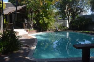 The swimming pool at or close to Cycad Lodge