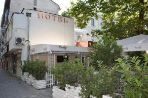 a hotel on the side of a street at Hotel Trakia in Plovdiv