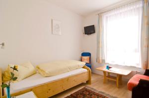Voodi või voodid majutusasutuse Dolomitenhof toas