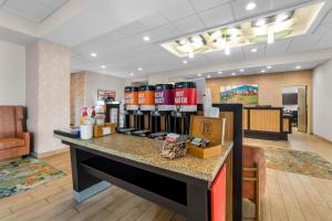 a store with a counter with products on it at Hampton Inn Marion in Marion