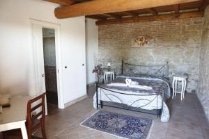 Postel nebo postele na pokoji v ubytování Il Borgo Ariccia Resort
