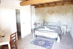 Postel nebo postele na pokoji v ubytování Il Borgo Ariccia Resort