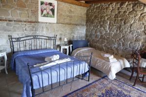 Postel nebo postele na pokoji v ubytování Il Borgo Ariccia Resort