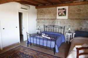 Postel nebo postele na pokoji v ubytování Il Borgo Ariccia Resort
