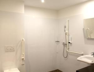 Koupelna v ubytování Come IN Hotel
