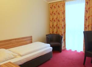 Postel nebo postele na pokoji v ubytování Come IN Hotel