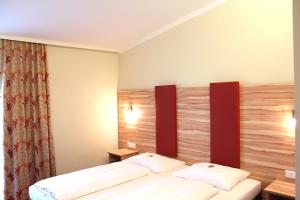Postel nebo postele na pokoji v ubytování Come IN Hotel