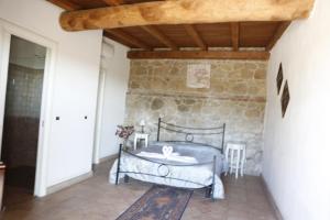 Postel nebo postele na pokoji v ubytování Il Borgo Ariccia Resort
