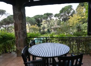 a table and chairs on a balcony with a view at Homenfun Costa Brava Begur Villa in Begur