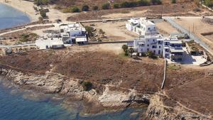 an aerial view of an island with white buildings at Calm Paros in Logaras