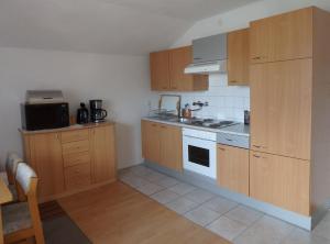 Kuchyň nebo kuchyňský kout v ubytování Ferienwohnung Piontek