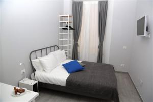 Posteľ alebo postele v izbe v ubytovaní B&B Pika 48