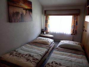 Postel nebo postele na pokoji v ubytování Ferienwohnung Piontek