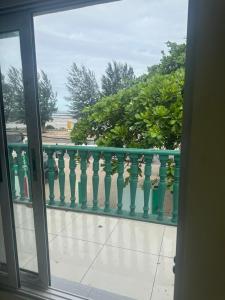a view of the ocean from a balcony at Vaidosa Guesthouse in Maputo