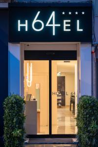 a store front with a sign that reads hirsch at Hotel 64 Nice in Nice