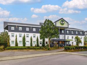 a rendering of the exterior of a hotel at B&B HOTEL Gießen-Linden in Gießen